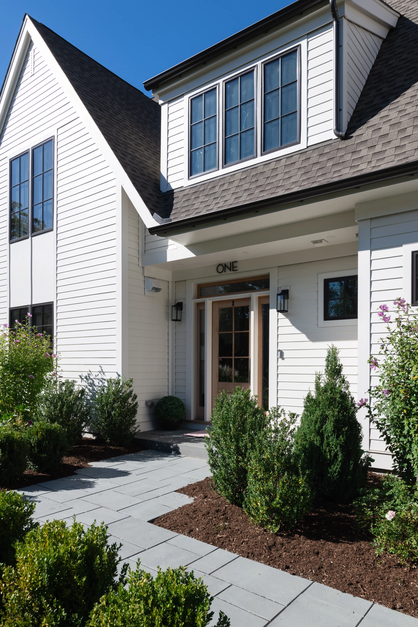 Finished front entrance of Project One on James Street in East Greenwich, Rhode Island, delivered by Hill & Harbor's integrated design-build team