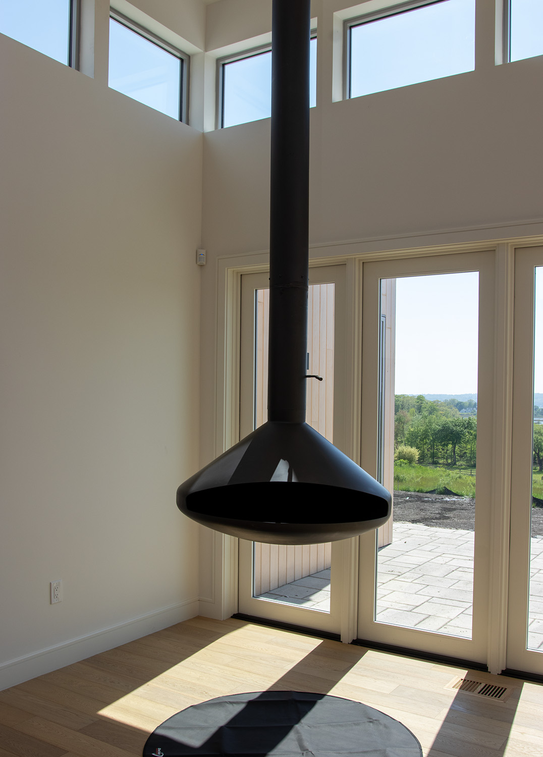Modern hanging fireplace sakonnet river view ri