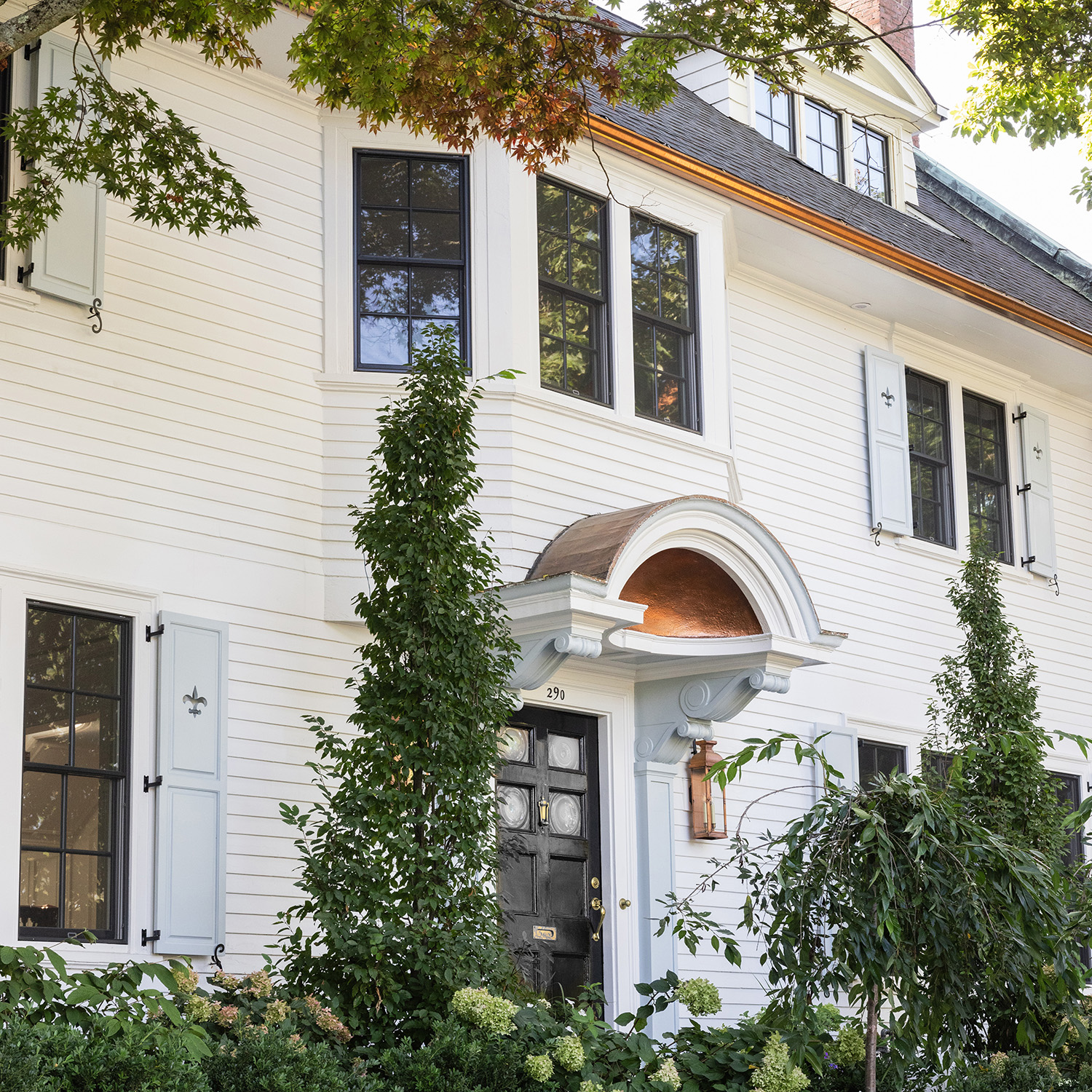 Front exterior of a beautifully restored historic home, blending classic design with modern updates