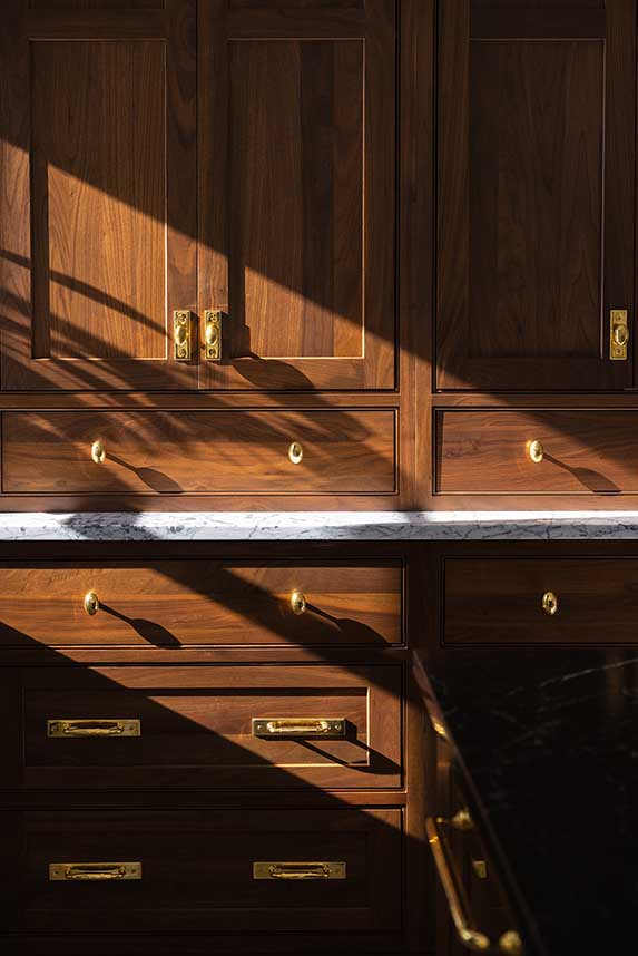 Unlacquered brass cabinet hardware detail
