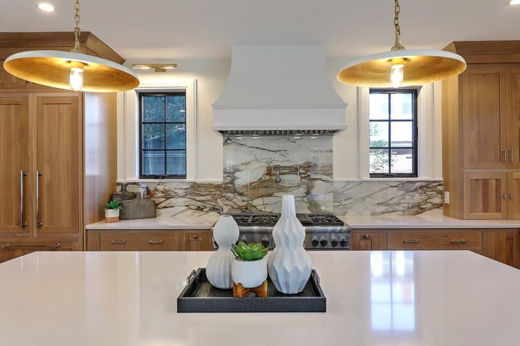 Detail view of the expansive quartz kitchen island, perfect for family gathering and entertaining.