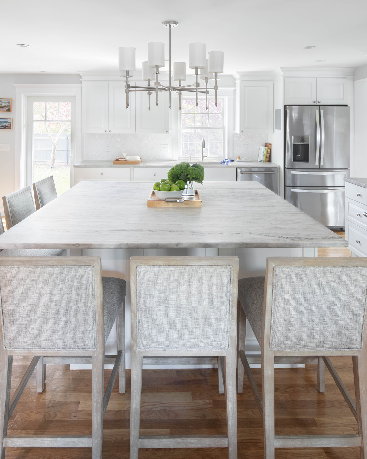 Panoramic view of a bright, modern kitchen renovation designed for a family living in a historic Rhode Island home.
